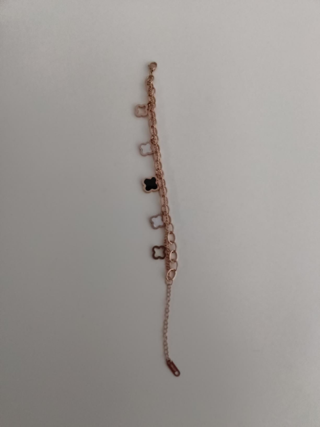 Rose kleurige armband met bedels