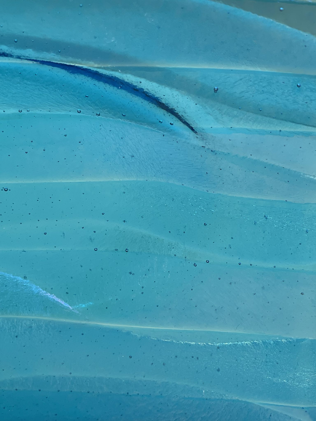 Kiln Carved Dish in Rainbow Iridescent on Transparent Turquoise.