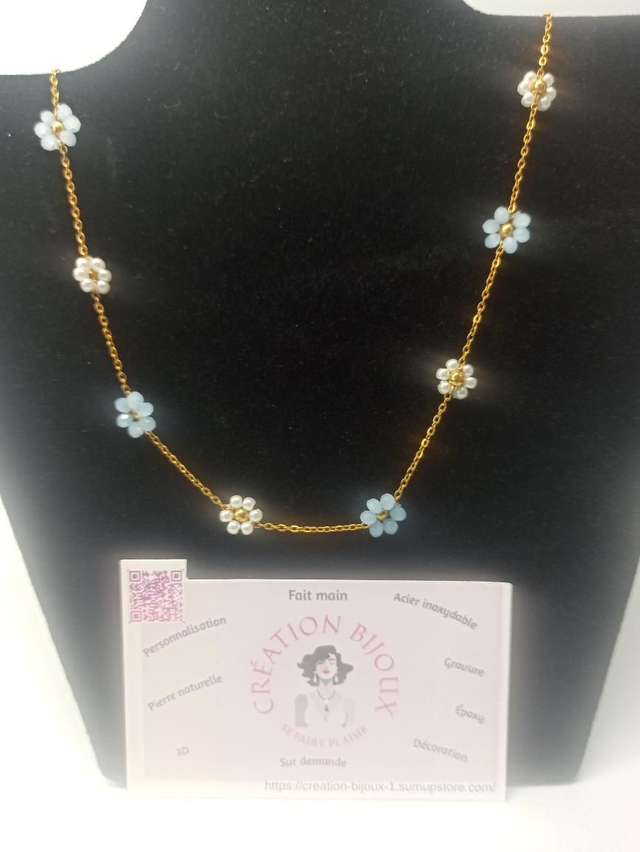 Collier fleur bleu et blanc 