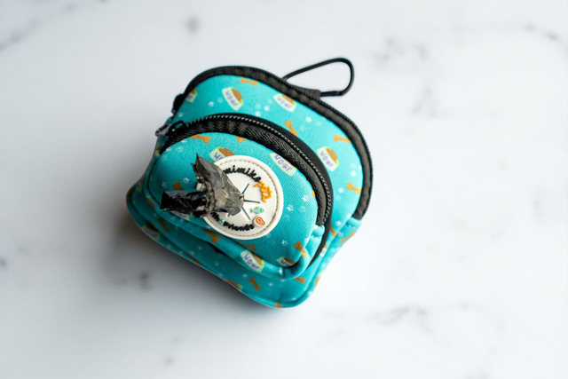 Woof | Bolsa para Sacos + Snacks