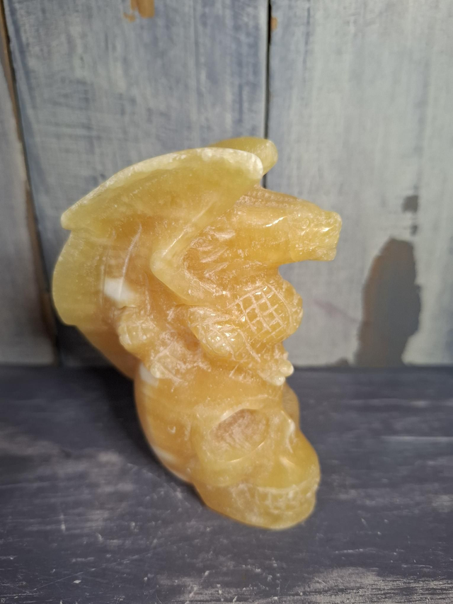 Orange Calcite Skull and Dragon 