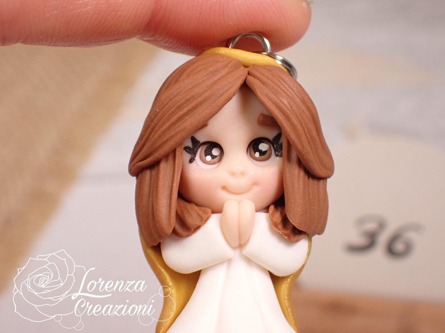 Angioletto custode tascabile n. 36
Portachiavi o charm, artigianale, pezzo unico. Modellato a mano argilla polimerica, made in Italy.