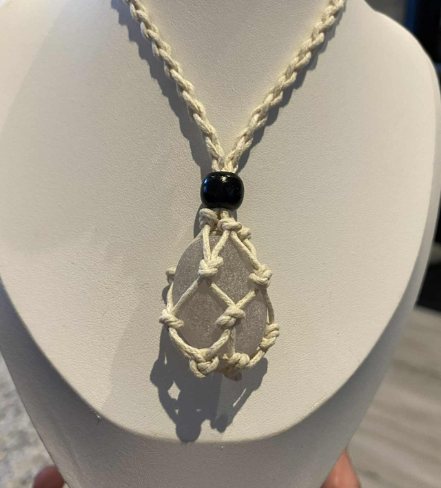 Adjustable necklace containing white sea glass