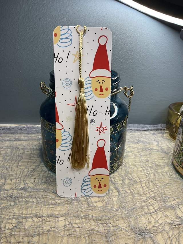 Handmade laminated Christmas bookmarks. Beautiful gift for book lovers.