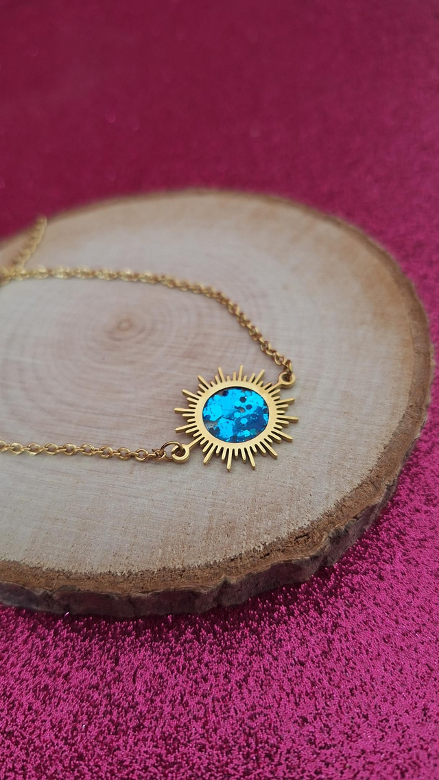 Bracelet soleil doré paillettes bleues claires