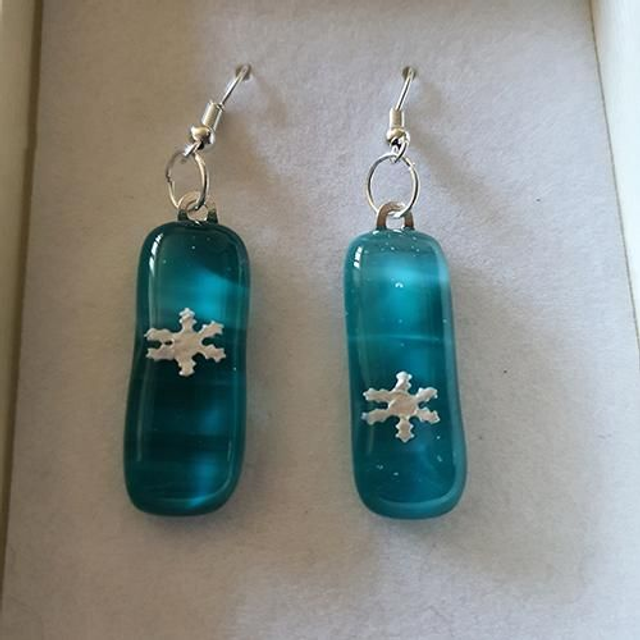 Emerald green whispy glass with silver snowflake design dangly earrings 