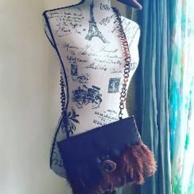 Pochette cuir Plumes autruche