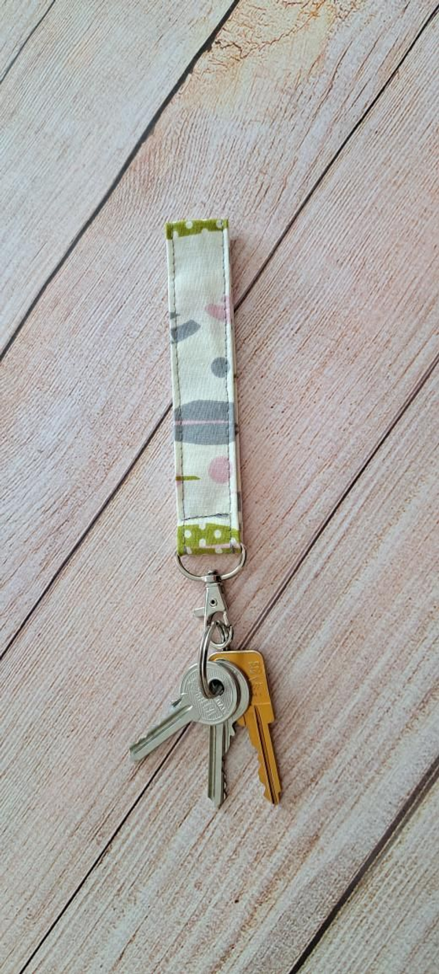 Porte clefs dragonne plumes