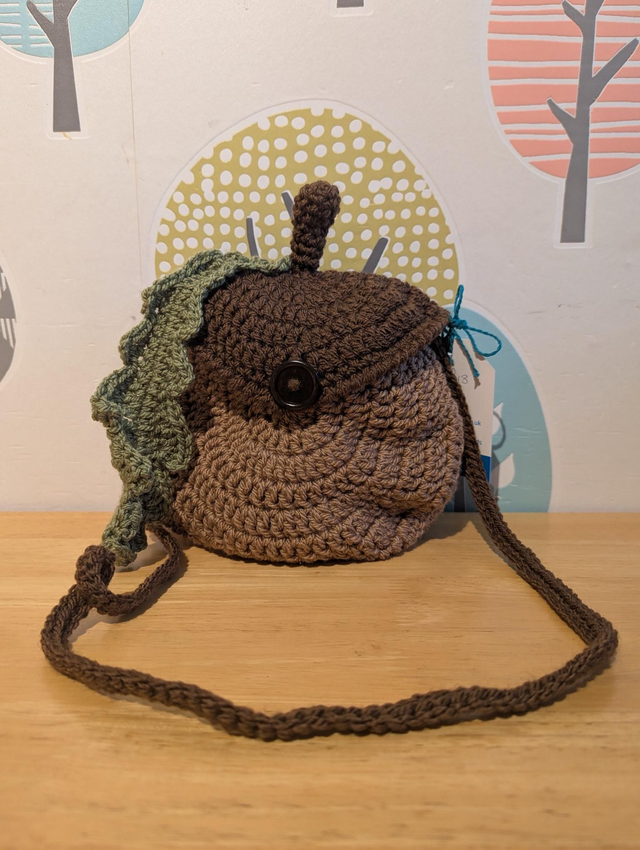Acorn cross body bag