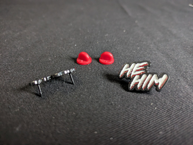 John Carpenter's "They Live" Inspired He/Him Pronoun Pin Badge