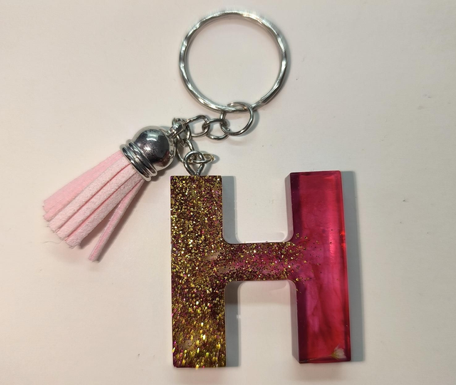 Porte clés initiale "H" doré rose fumé 
