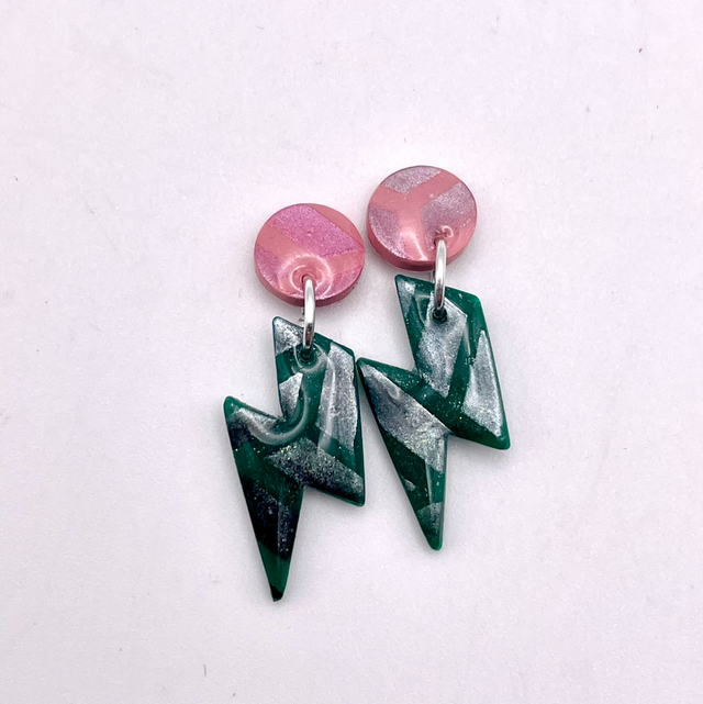 Small green and pink lightning bolts