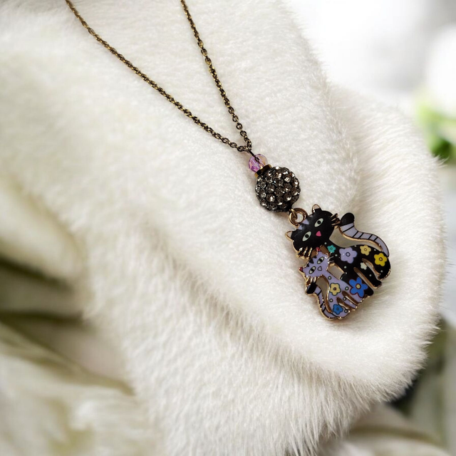 Collier acier inoxydable et cristal parme et noir chats