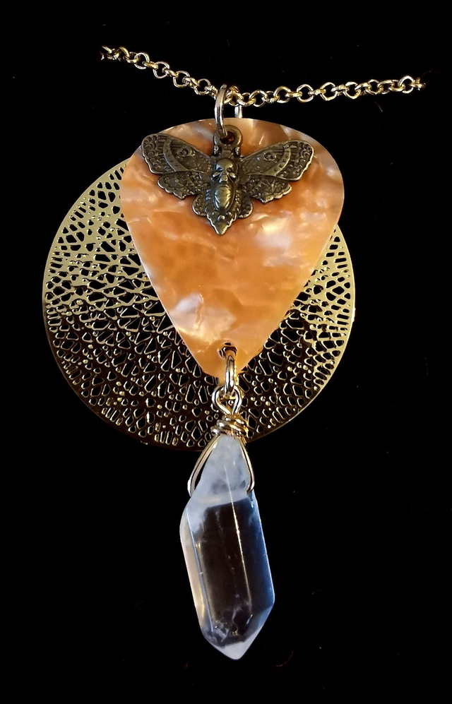 Collier médiator et pointe de cristal de roche