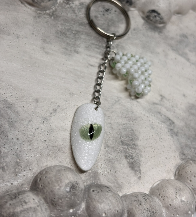 Porte-clé œil dragon blanc
