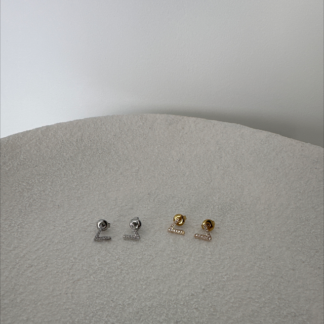 BOUCLES D’OREILLES HISTÓRIA