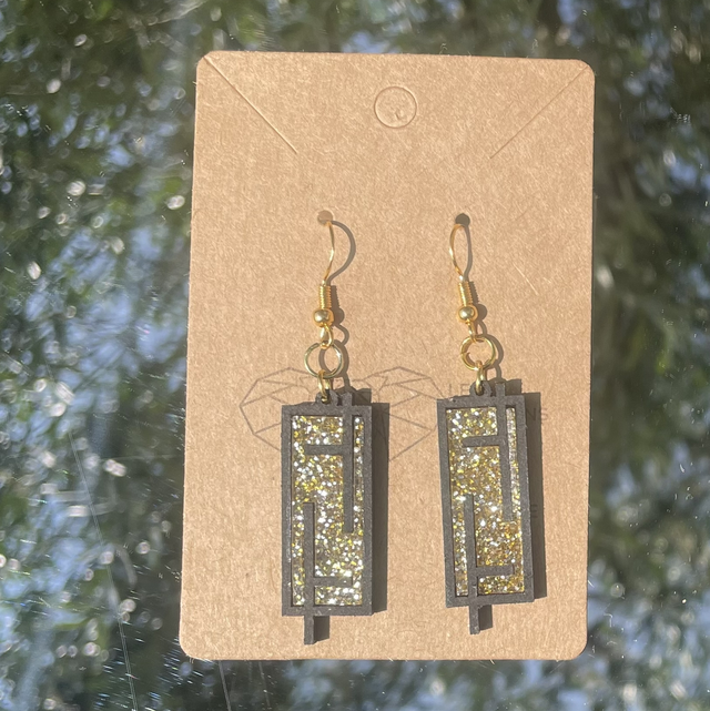 Boucles d oreilles noires et or