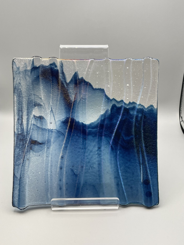 Kiln Carved  Iridescent Platter on Blue and Clear Streaky Glass