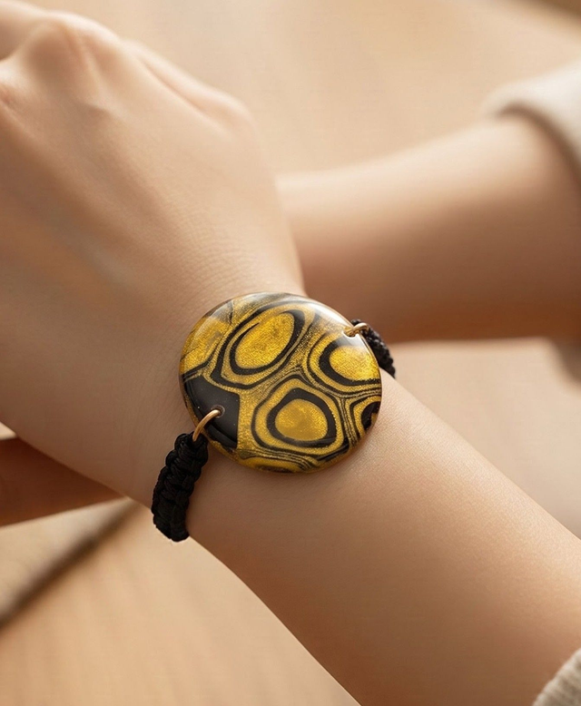 Bracelet black and gold