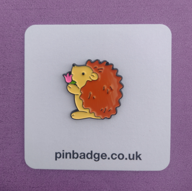 Hedgehog holding a flower