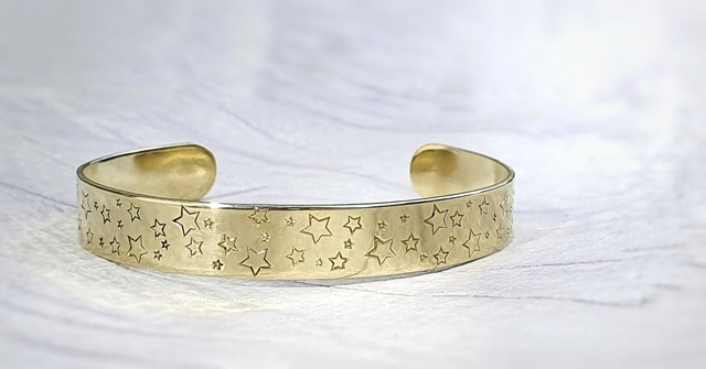 "When the barn falls down " handstamped brass cuff