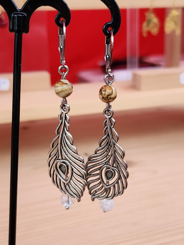 Boucle plume argenté 