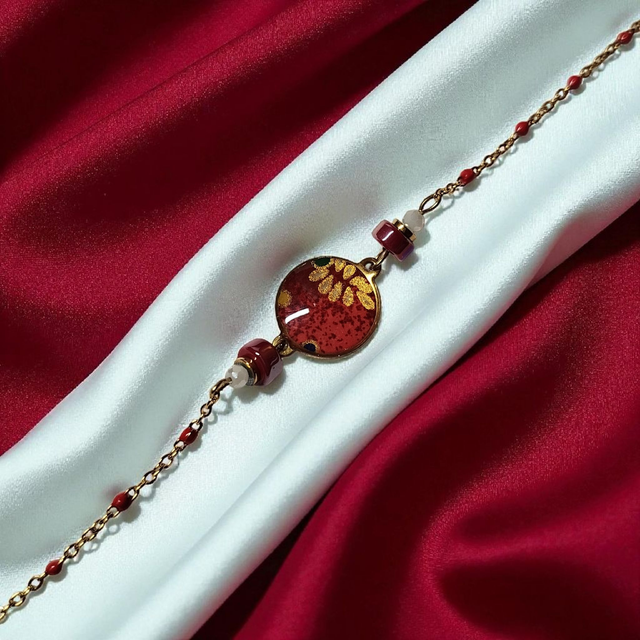 bracelet acier inoxydable motifs japonais rouge bordeaux et doré