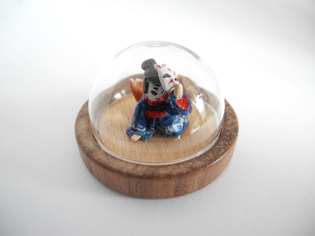 Kitsune disguised as Geisha in a Kimono adorned with waves - miniature pendant for Japan enthusiasts
