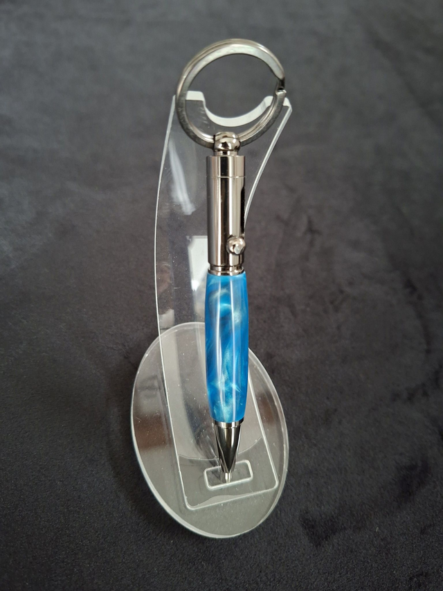 Porte clef stylo Colt en résine bleue