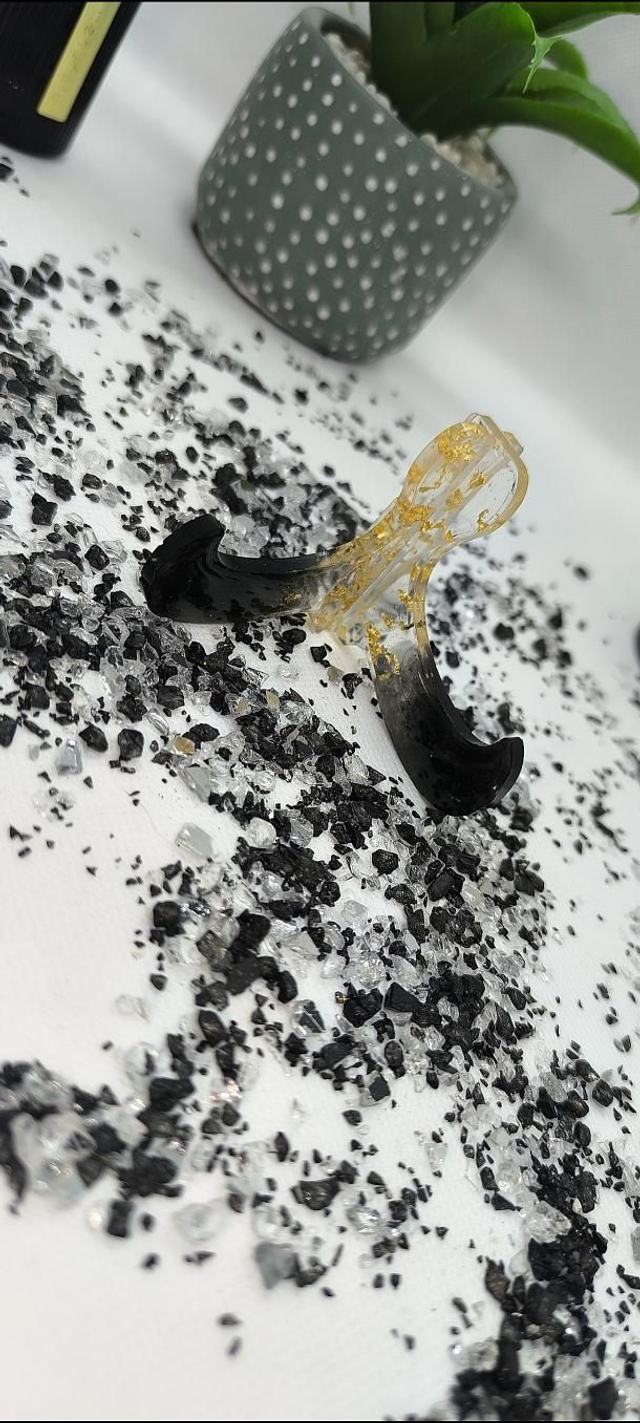 Porte téléphone transportable noir et feuilles d'or 