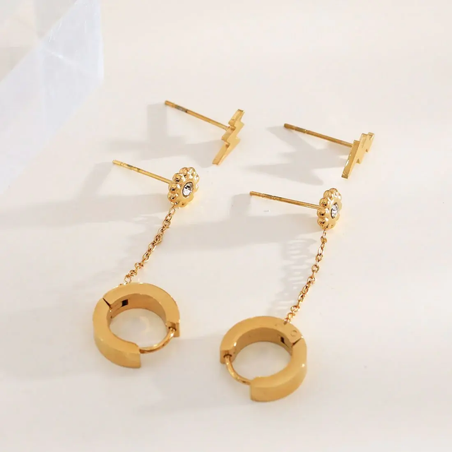 Triple paire de boucles d'oreilles fleur