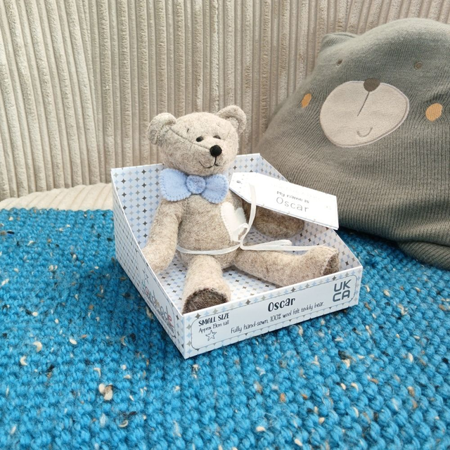 Oscar. Small size, handmade teddy bear. UKCA. Tray base packaging. Limited Edition Wool Felt.  Brown. White. Blue.