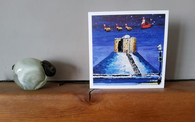 Father Christmas flying over Clifford&#039;s Tower, York. 6x6&quot; christmas card