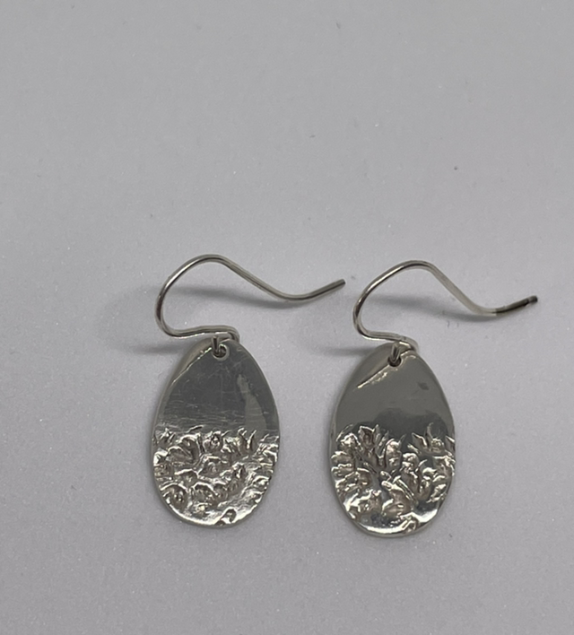 Oval 1/2 textured silver earrings