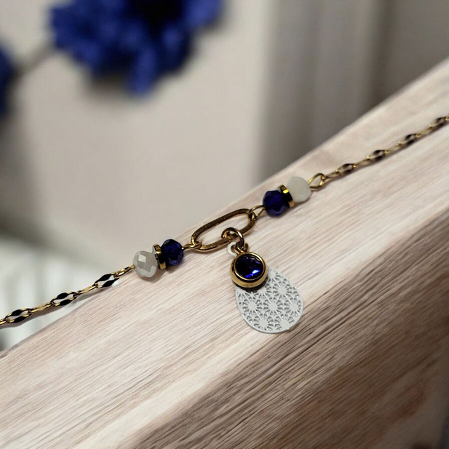 Bracelet acier inoxydable et strass bleu foncé et doré