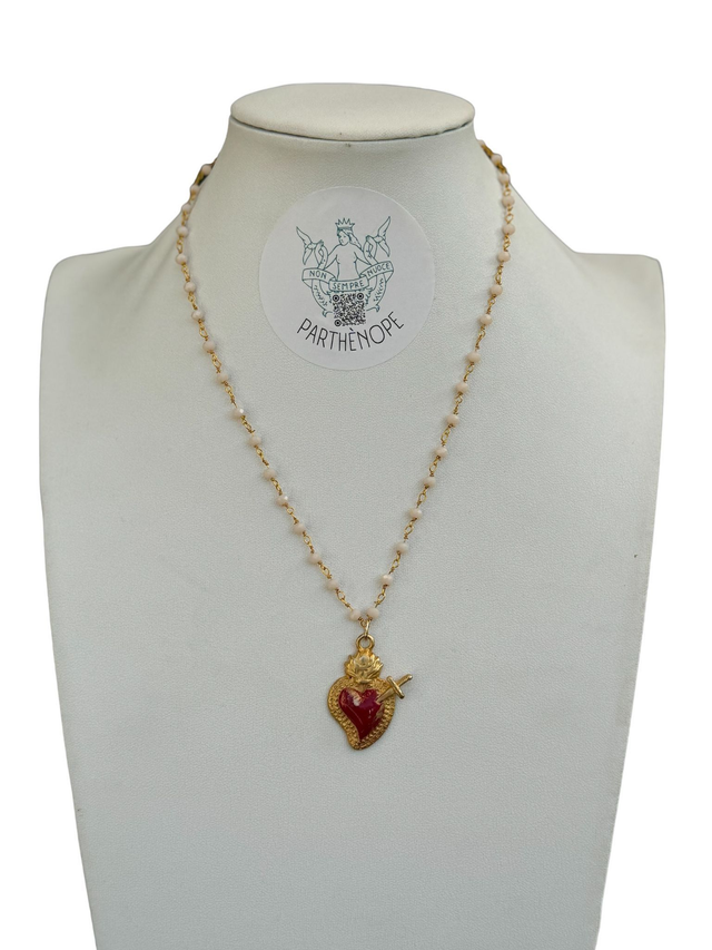 Cuore rosso con spada