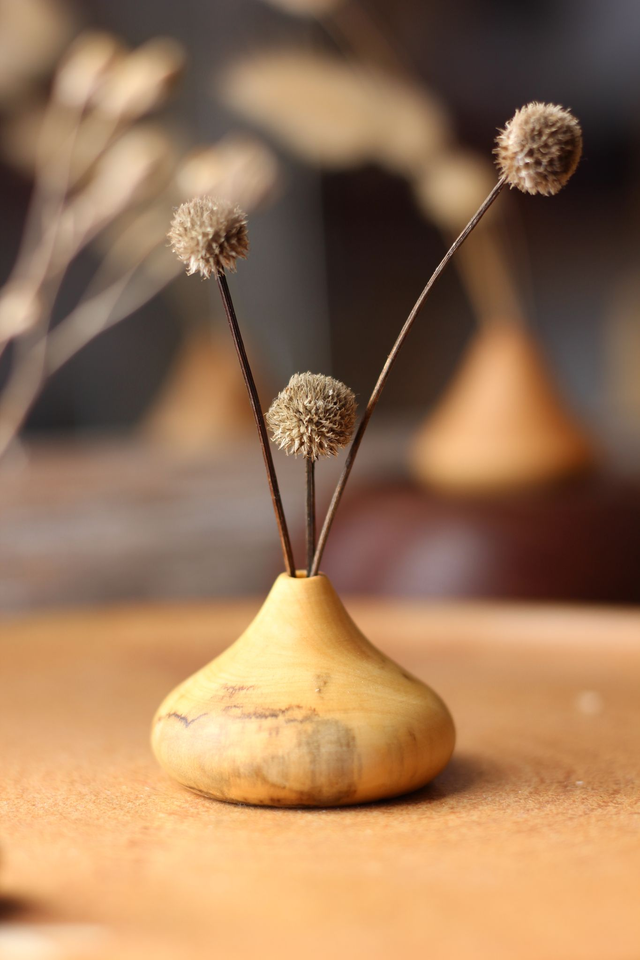 Lot de petits soliflores en bois
