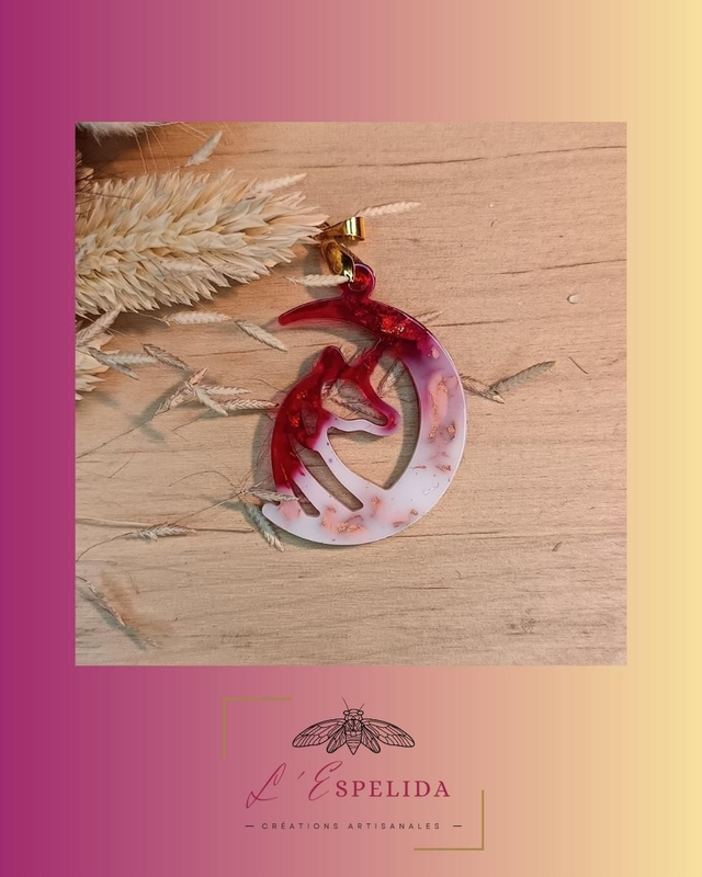 Pendentif licorne rouge et blanc 