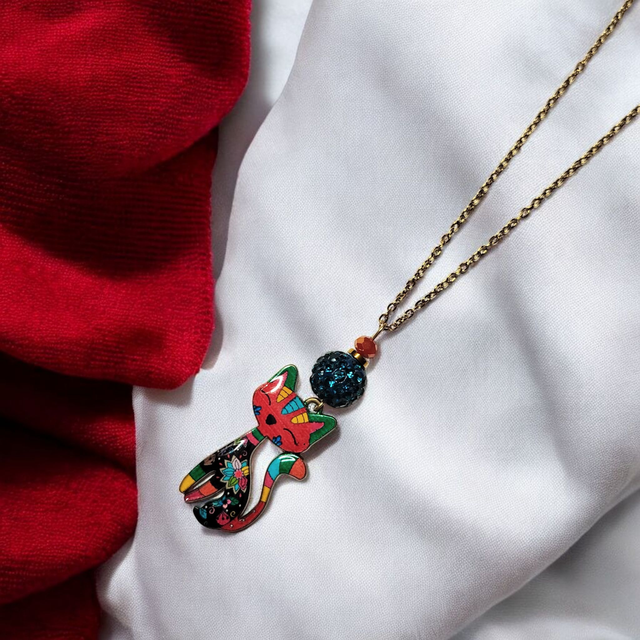 Collier acier inoxydable et cristal rouge et vert chat