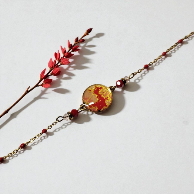 bracelet acier inoxydable motifs japonais rouge et doré
