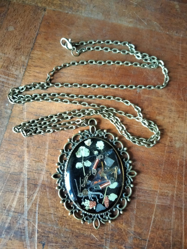 Pendentif papillon mécanique 