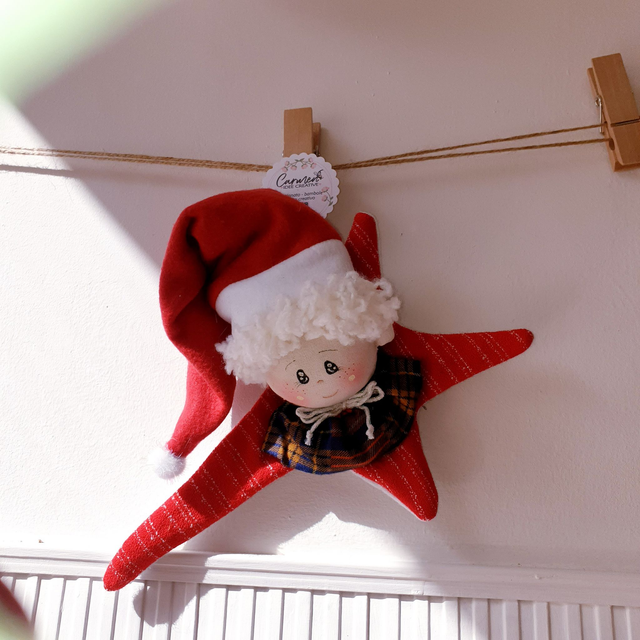 Addobbo natalizio elfo su stella piatta