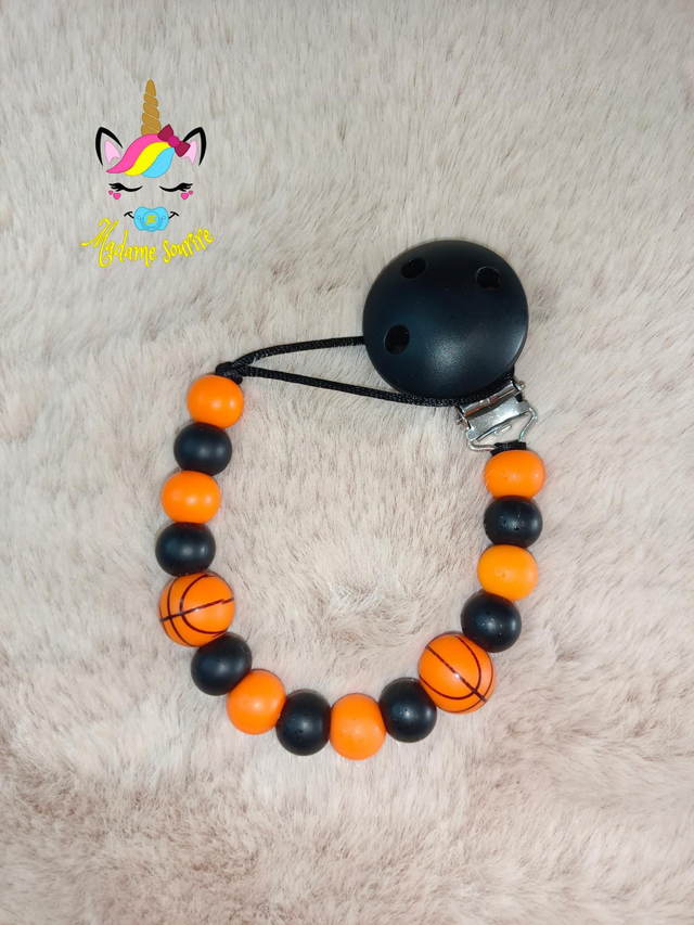 Attache tétine Basket