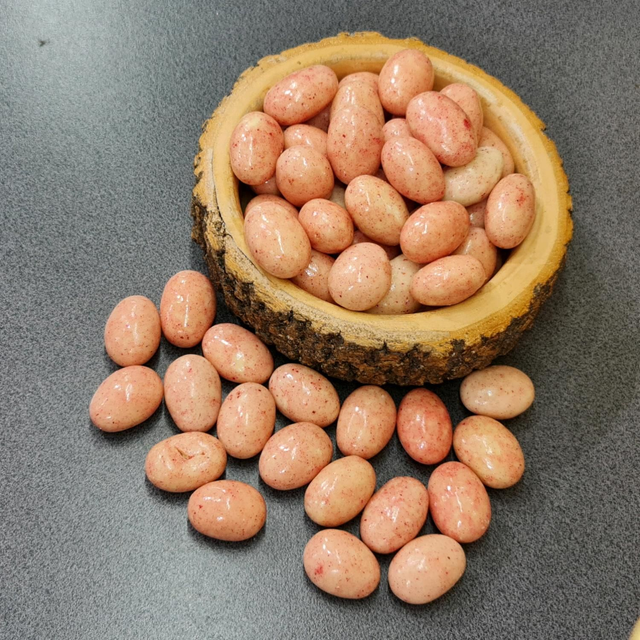 Mandel in weißer Schokolade und Himmbeer