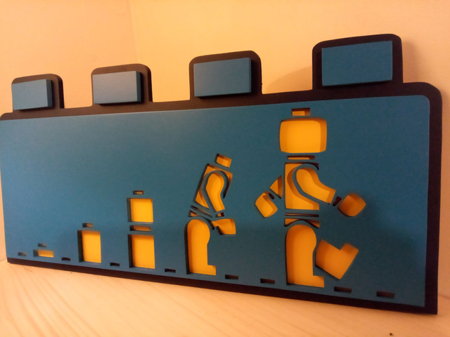 Evolution de l&#039;Homme Lego - 40x20 cms