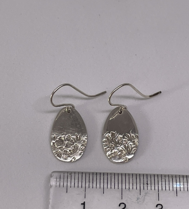 Oval 1/2 textured silver earrings
