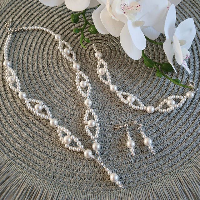 Dames set met witte schelp pareltjes (10.001)