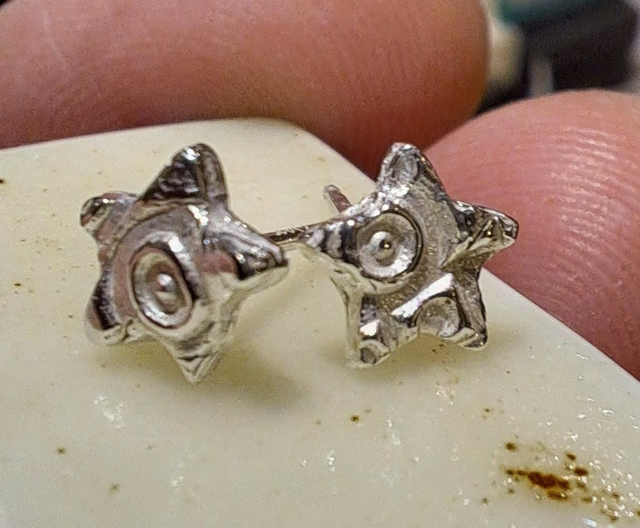 Swirly star studs