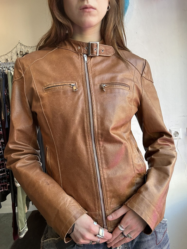 brown leather jacket with front zipper pockets