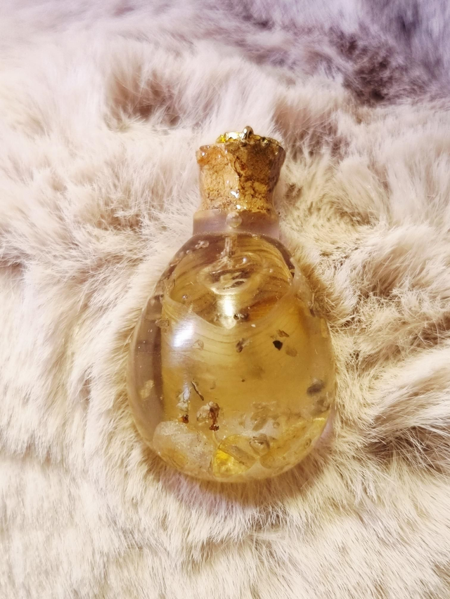 Le Pendentif Potion #55 - Joie